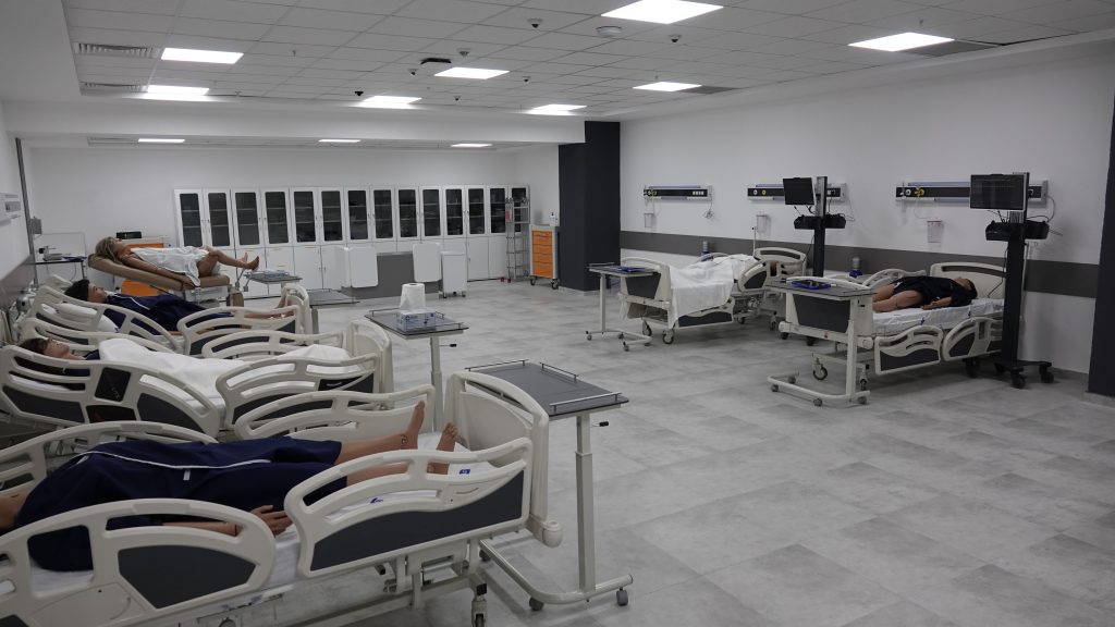 Researchers and healthcare professionals engaging in simulation-based clinical training at Vital Simulation Center in Ankara, Turkey.