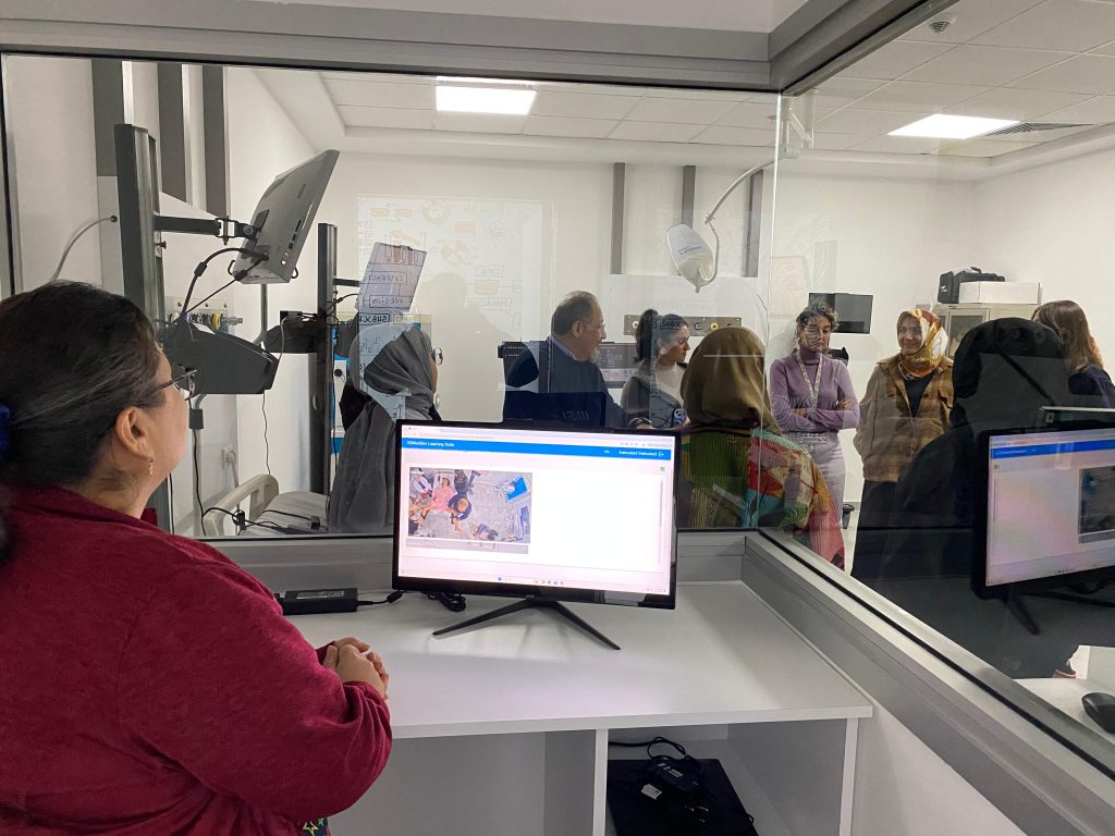 Researchers and healthcare professionals engaging in simulation-based clinical training at Vital Simulation Center in Ankara, Turkey.