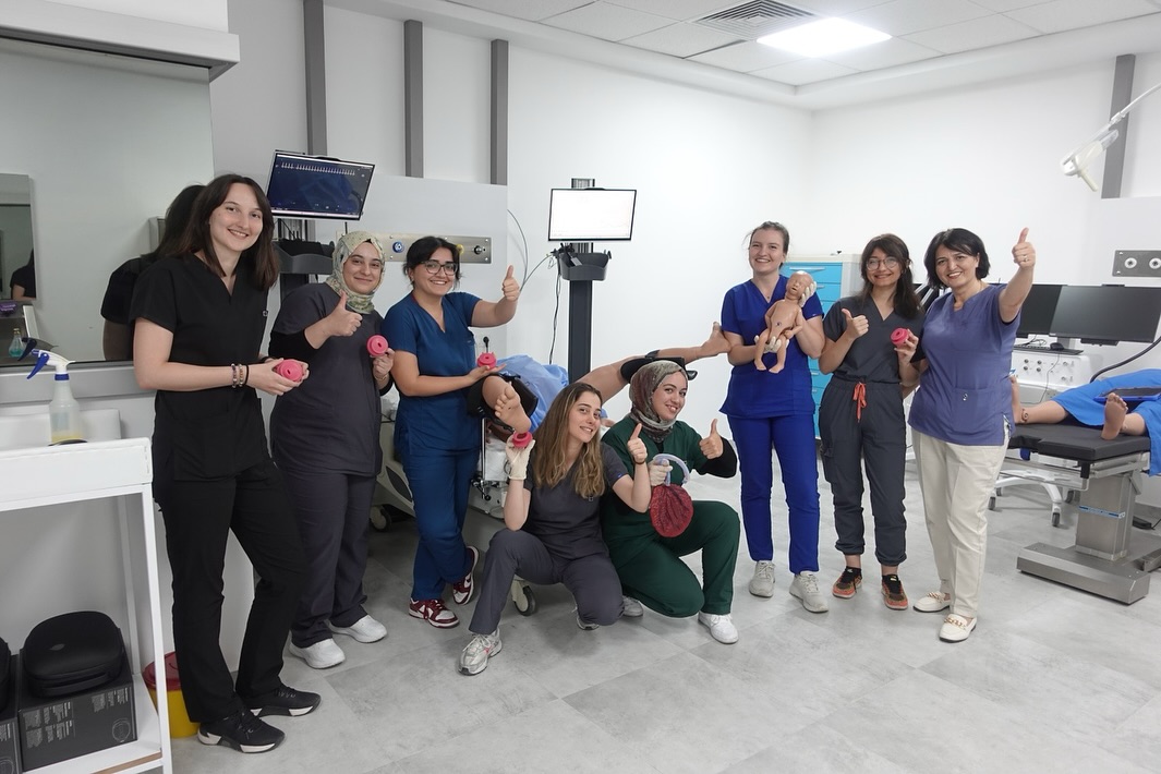 Students participating in health sciences simulation training in Turkey at VITAL Simulation Center, practicing patient care with advanced simulators.
