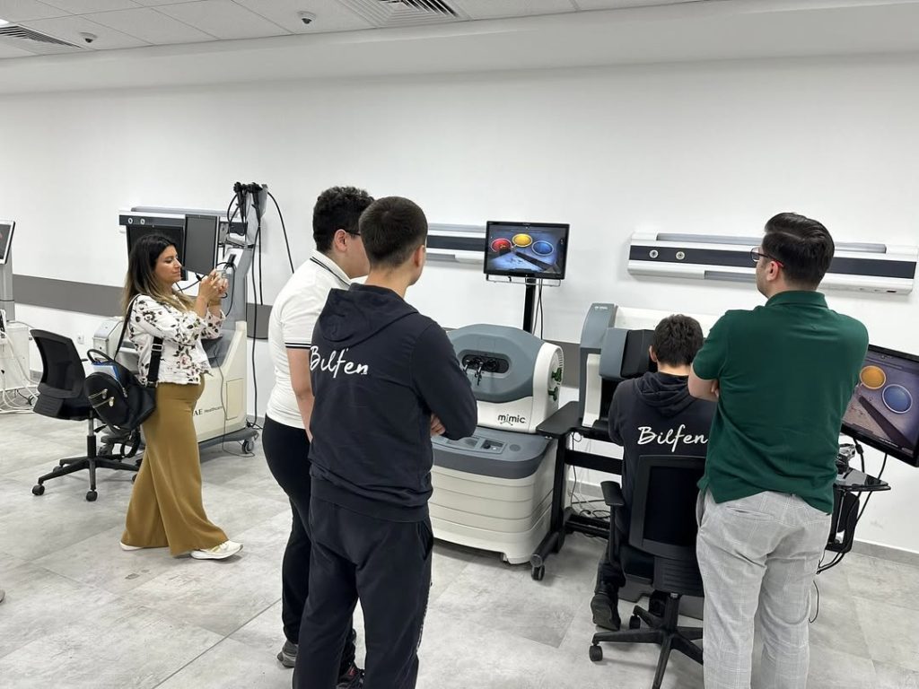 Students engaging in digital learning and simulation at VITAL Simulation Center, combining online modules with hands-on healthcare training.